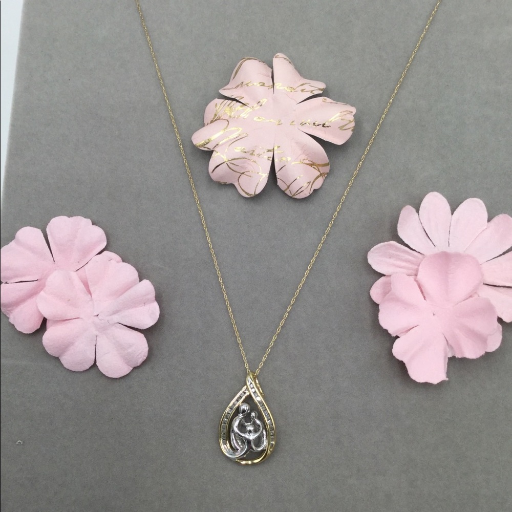 Gold necklace mother and child and diamonds